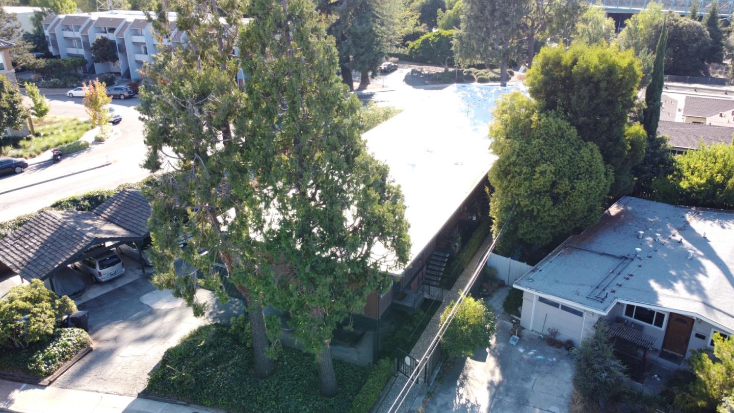 610 Walker Drive Mountain View, CA 94043 - Photo 5 of 23 a backyard of a house with lots of green space