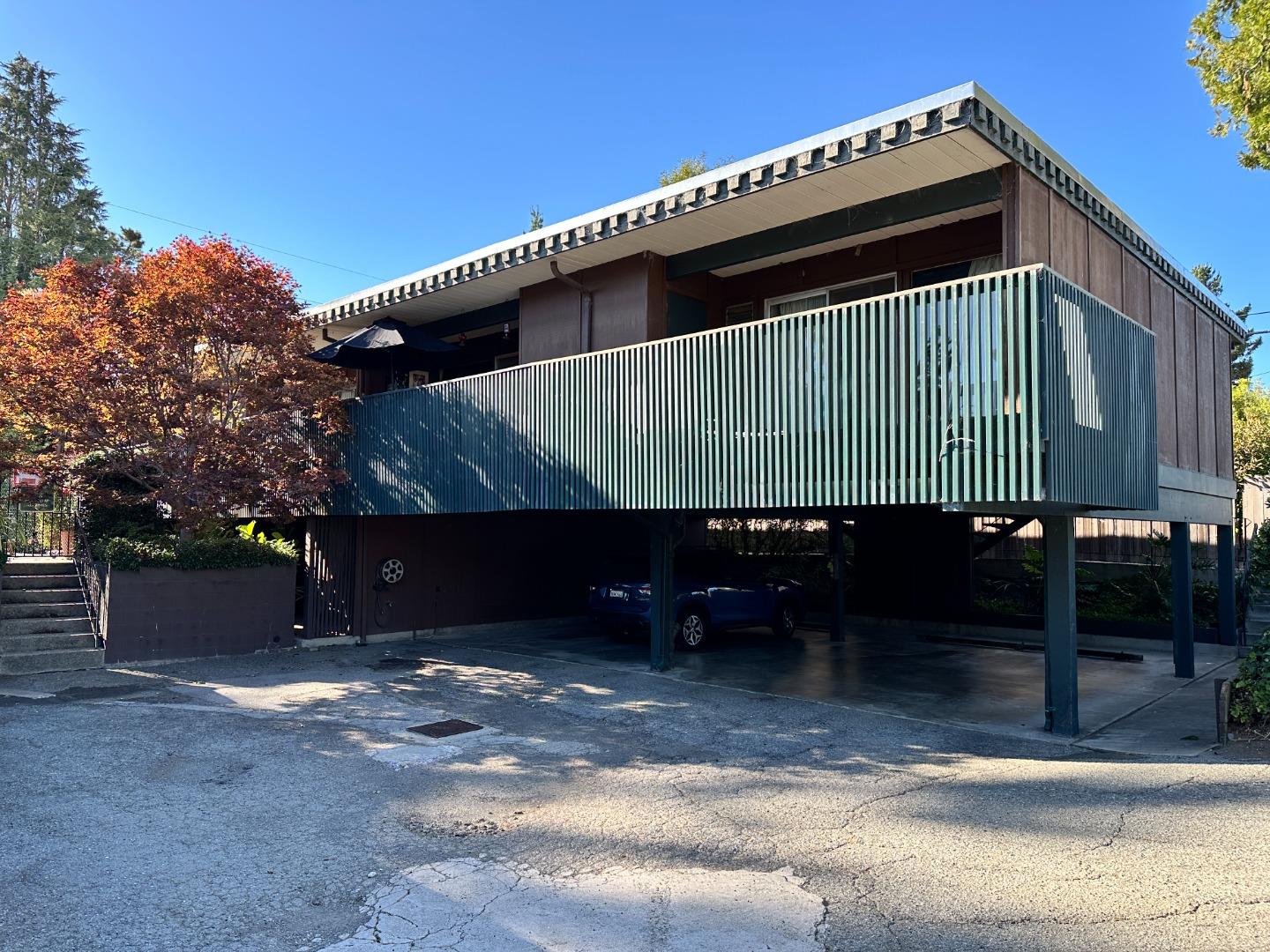610 Walker Drive Mountain View, CA 94043 - Photo 8 of 23 a back view of a house with a yard