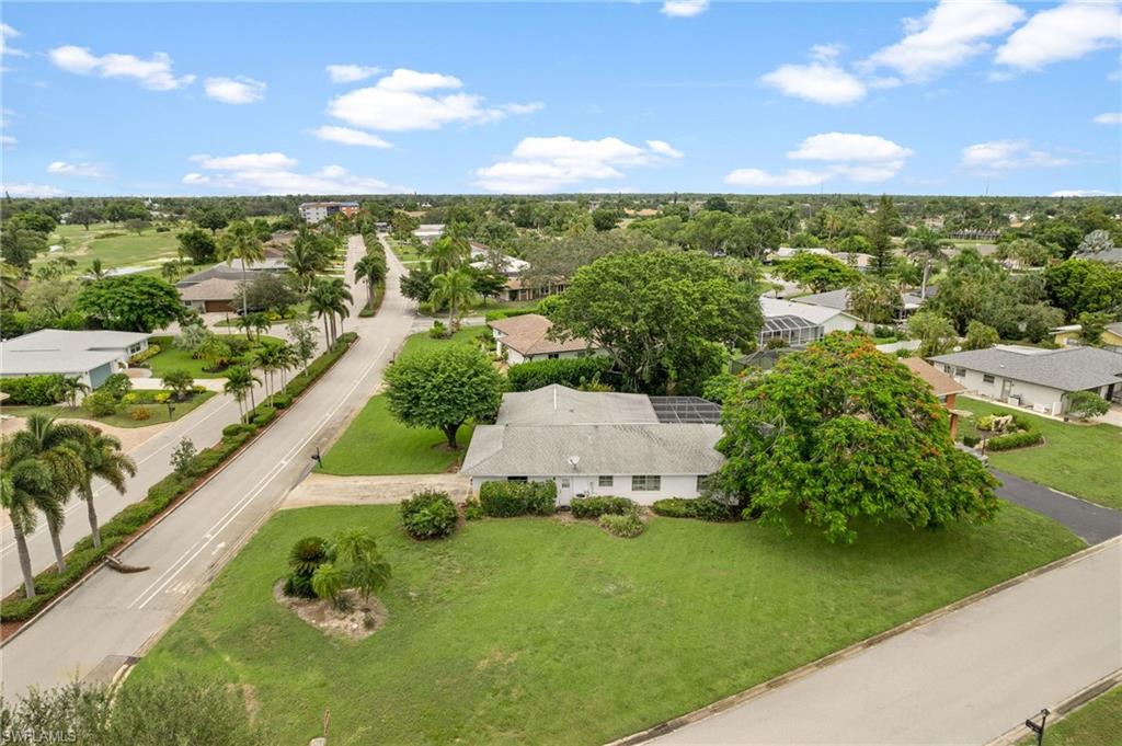 59 Pebble Beach Boulevard Naples, FL 34113 - Photo 26 of 32 a view of a city