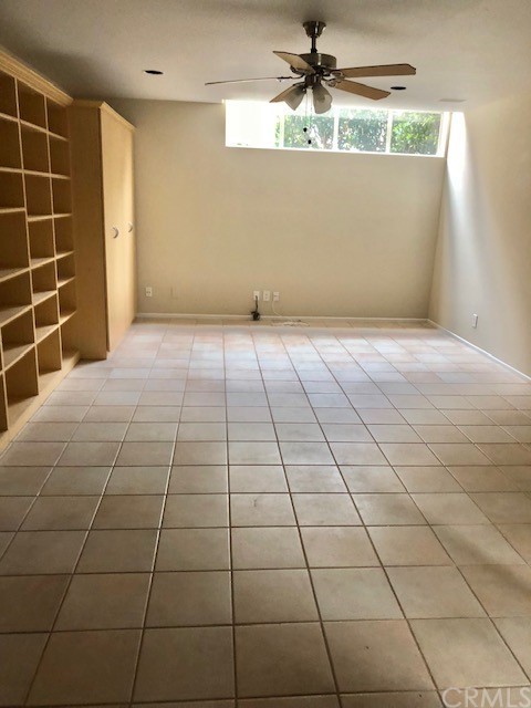 5 Torrigiani Aisle Irvine, CA 92606 - Photo 12 of 28 a view of a livingroom with an empty space and a window