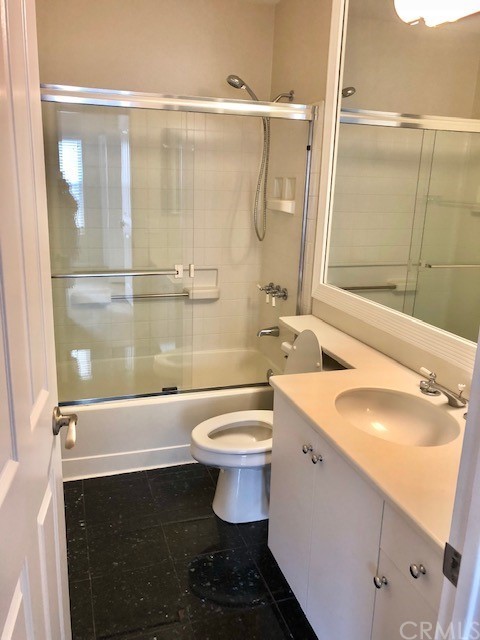 5 Torrigiani Aisle Irvine, CA 92606 - Photo 15 of 28 a bathroom with a sink toilet and shower