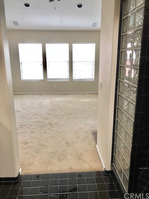 5 Torrigiani Aisle Irvine, CA 92606 - Photo 19 of 28 a bathroom with a shower