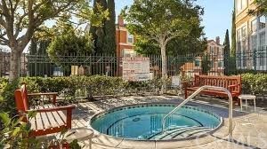 5 Torrigiani Aisle Irvine, CA 92606 - Photo 28 of 28 a swimming pool with outdoor seating and plants