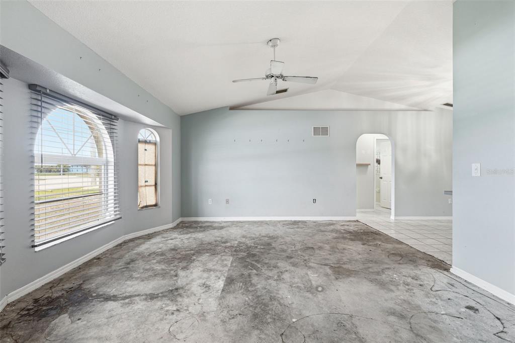 7510 Ligustrum Punta Gorda, FL 33955 - Photo 3 of 25 a view of an empty room with a window