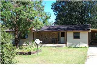 6161 Barnes Road Crestview, FL 32536 - Photo 1 of 3 a swimming pool with outdoor seating and yard