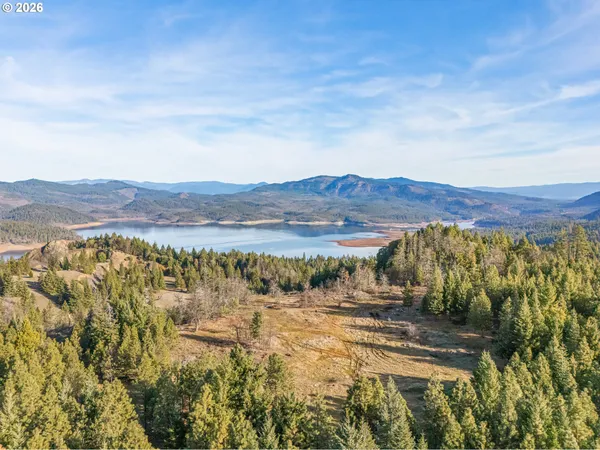 a view of a lake with mountains in the background