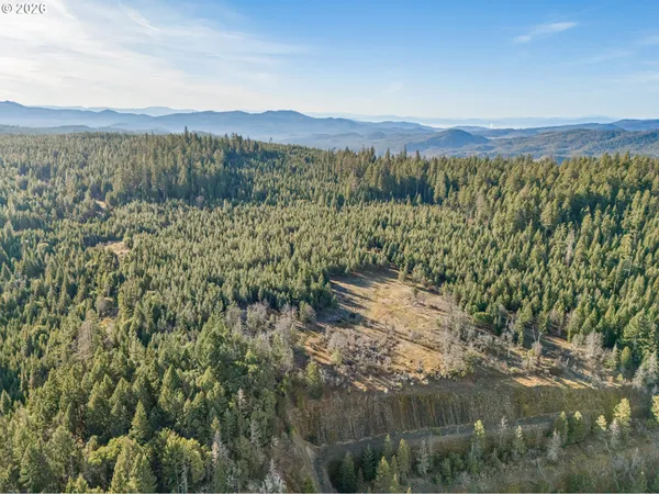 a view of a lake with mountains in the background