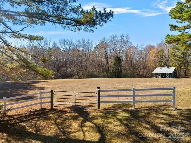 a view of backyard with green space