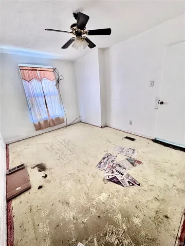 a view of a livingroom with wooden floor