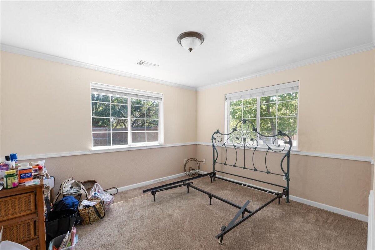 2308 Rabun Way Central Point, OR 97502 - Photo 19 of 26 a room with furniture and a window
