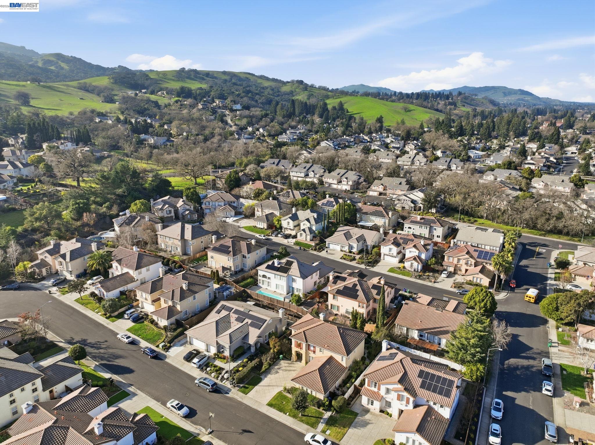 177 Elisha Lane San Ramon, CA 94583 - Photo 14 of 43 an aerial view of a city with lots of residential buildings and mountain view in back