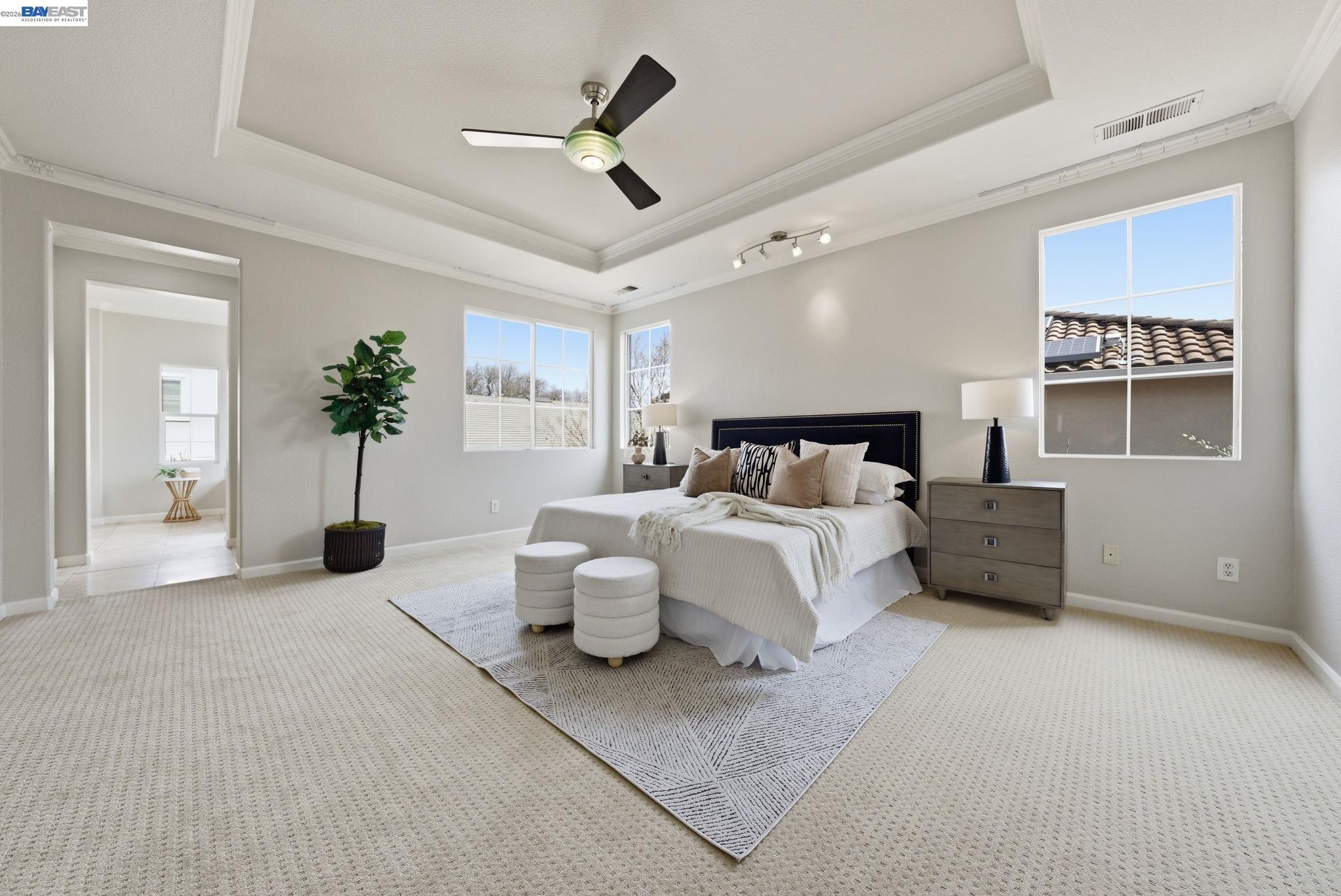 177 Elisha Lane San Ramon, CA 94583 - Photo 20 of 43 a bedroom with bed and a chandelier