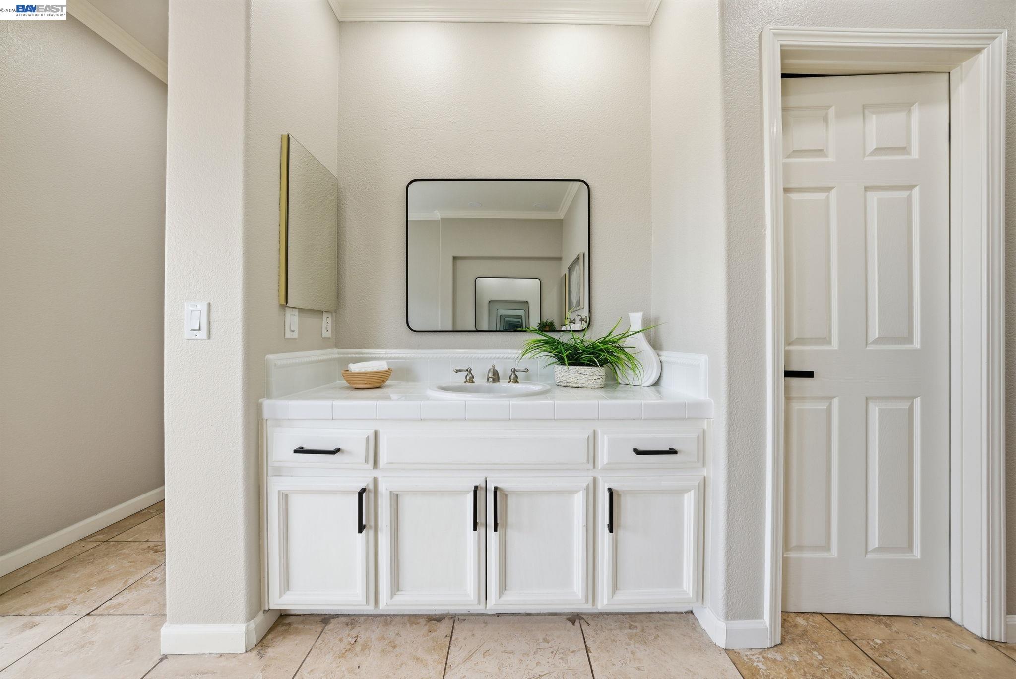 177 Elisha Lane San Ramon, CA 94583 - Photo 30 of 43 a bathroom with a sink and a mirror