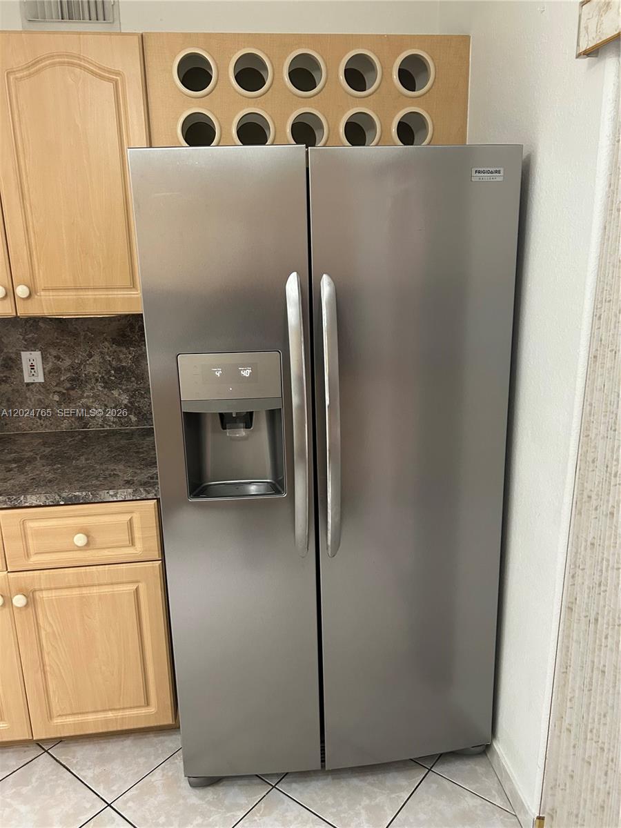 10919 West Okeechobee Road, Unit 101 Hialeah Gardens, FL 33018 - Photo 11 of 21 a utility room with dryer and washer