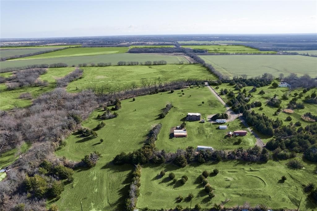 a view of a lush green field