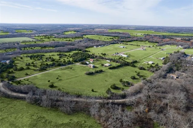 a view of a lush green field