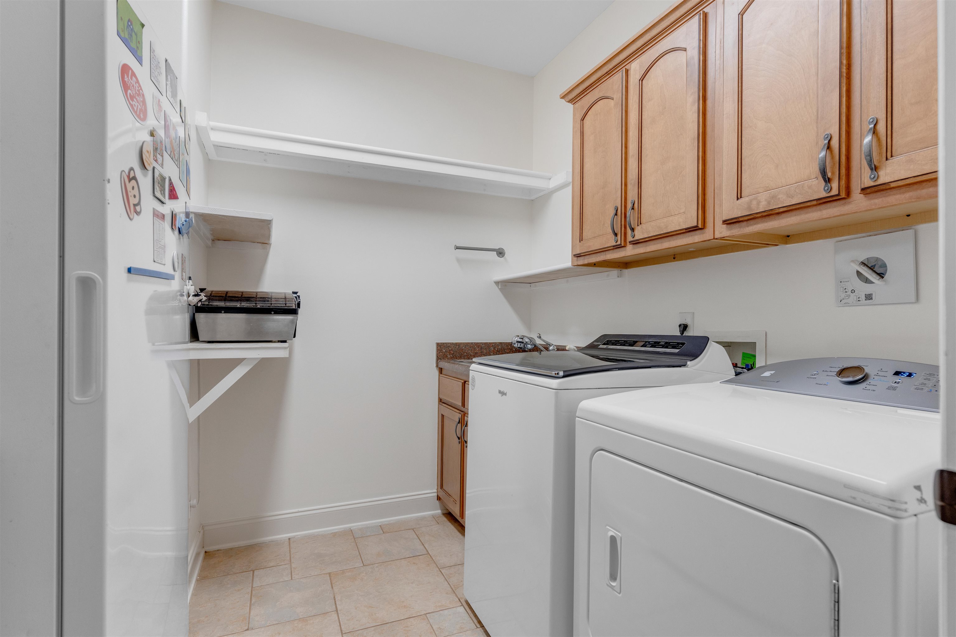 1075 Summer Spring Road Collierville, TN 38017 - Photo 15 of 40 a utility room with dryer and washer