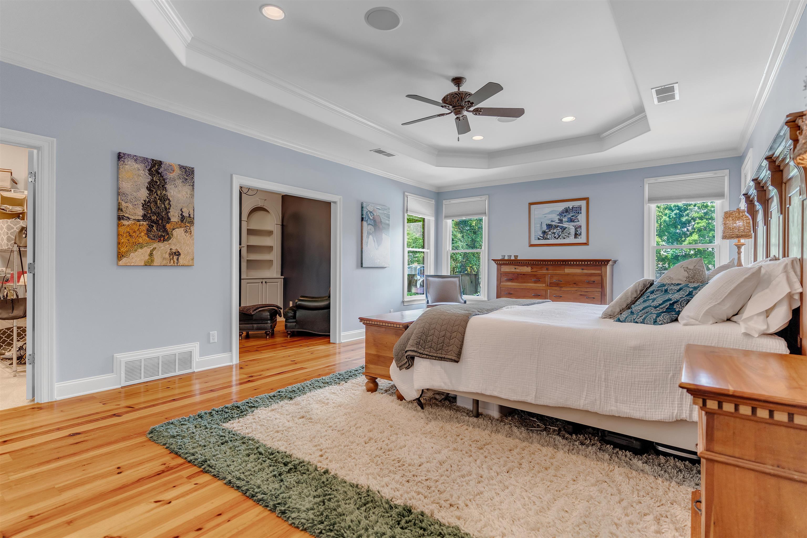 1075 Summer Spring Road Collierville, TN 38017 - Photo 17 of 40 a bedroom with a bed and wooden floor