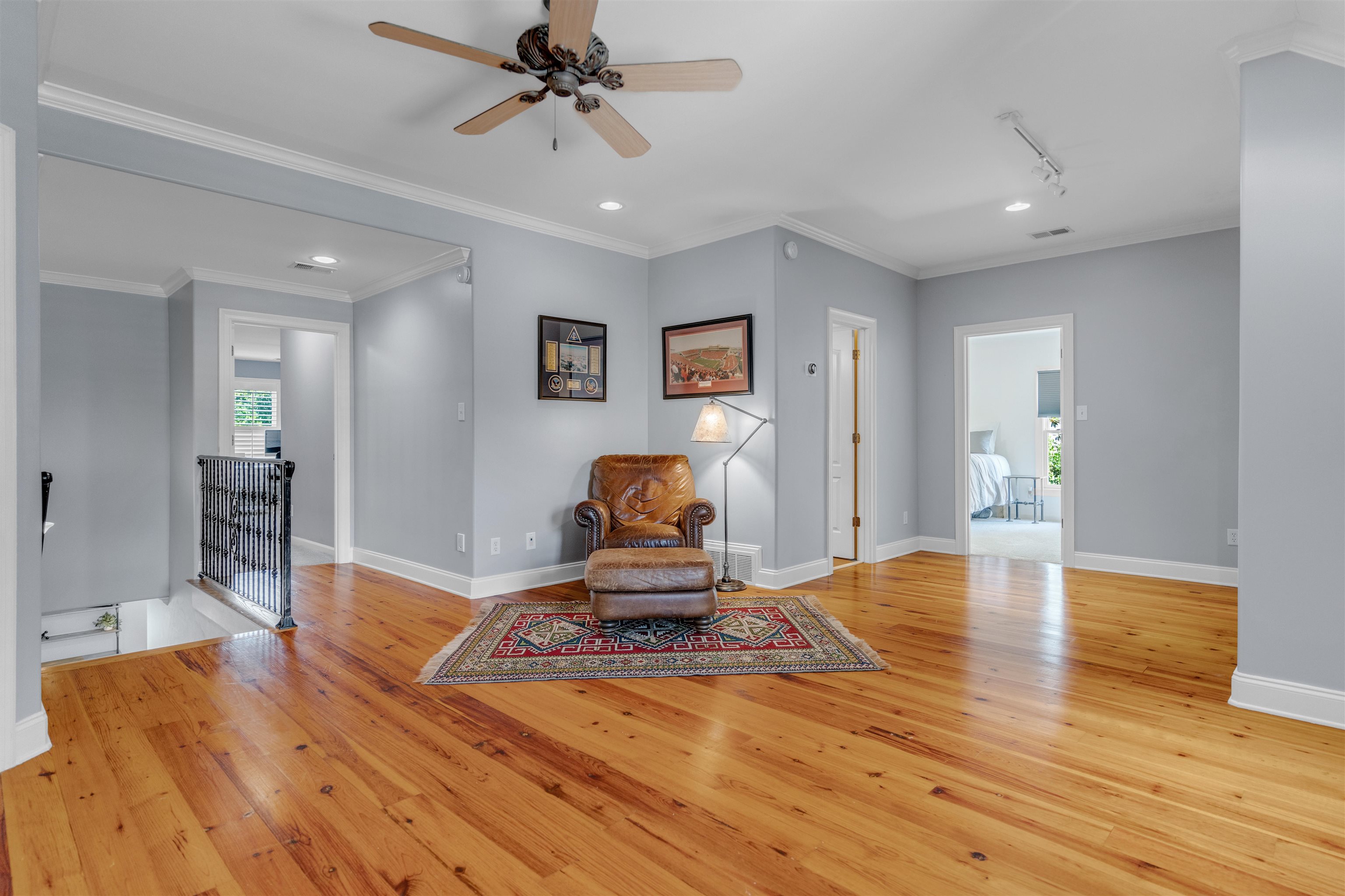 1075 Summer Spring Road Collierville, TN 38017 - Photo 26 of 40 a living room with furniture and a wooden floor