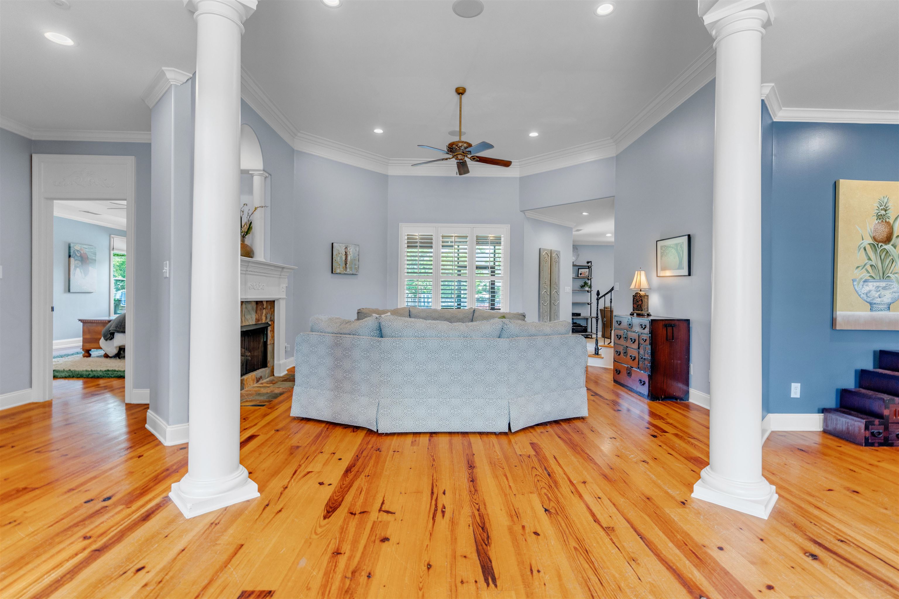 1075 Summer Spring Road Collierville, TN 38017 - Photo 3 of 40 a living room with kitchen island furniture and wooden floor