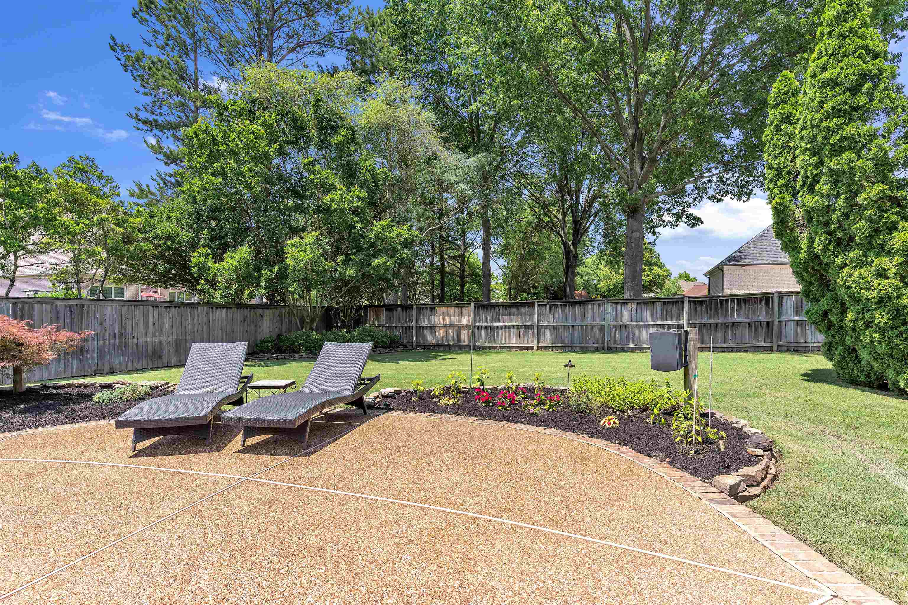 1075 Summer Spring Road Collierville, TN 38017 - Photo 35 of 40 a view of house with backyard outdoor seating and green space