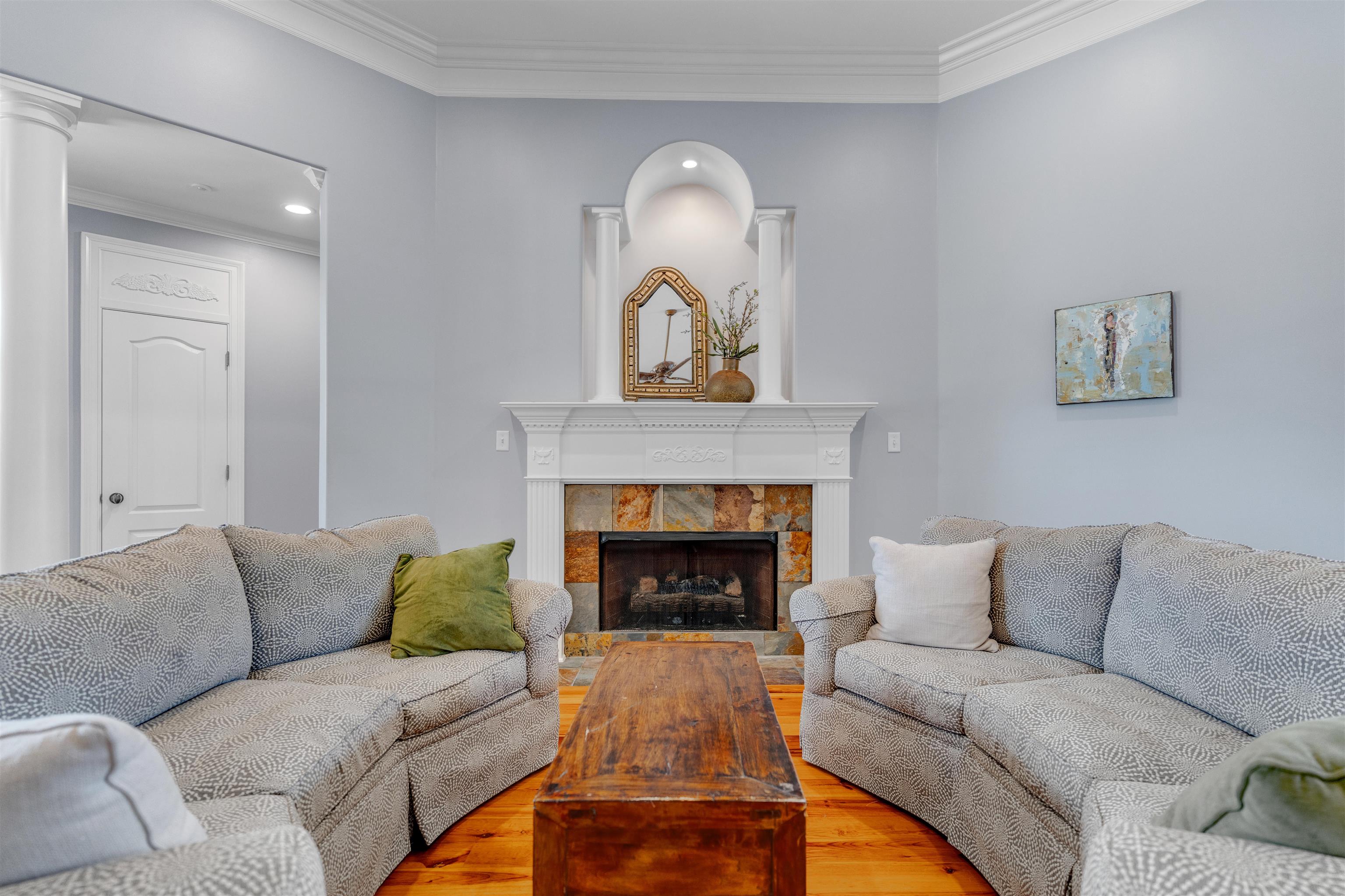 1075 Summer Spring Road Collierville, TN 38017 - Photo 5 of 40 a living room with furniture and a fireplace