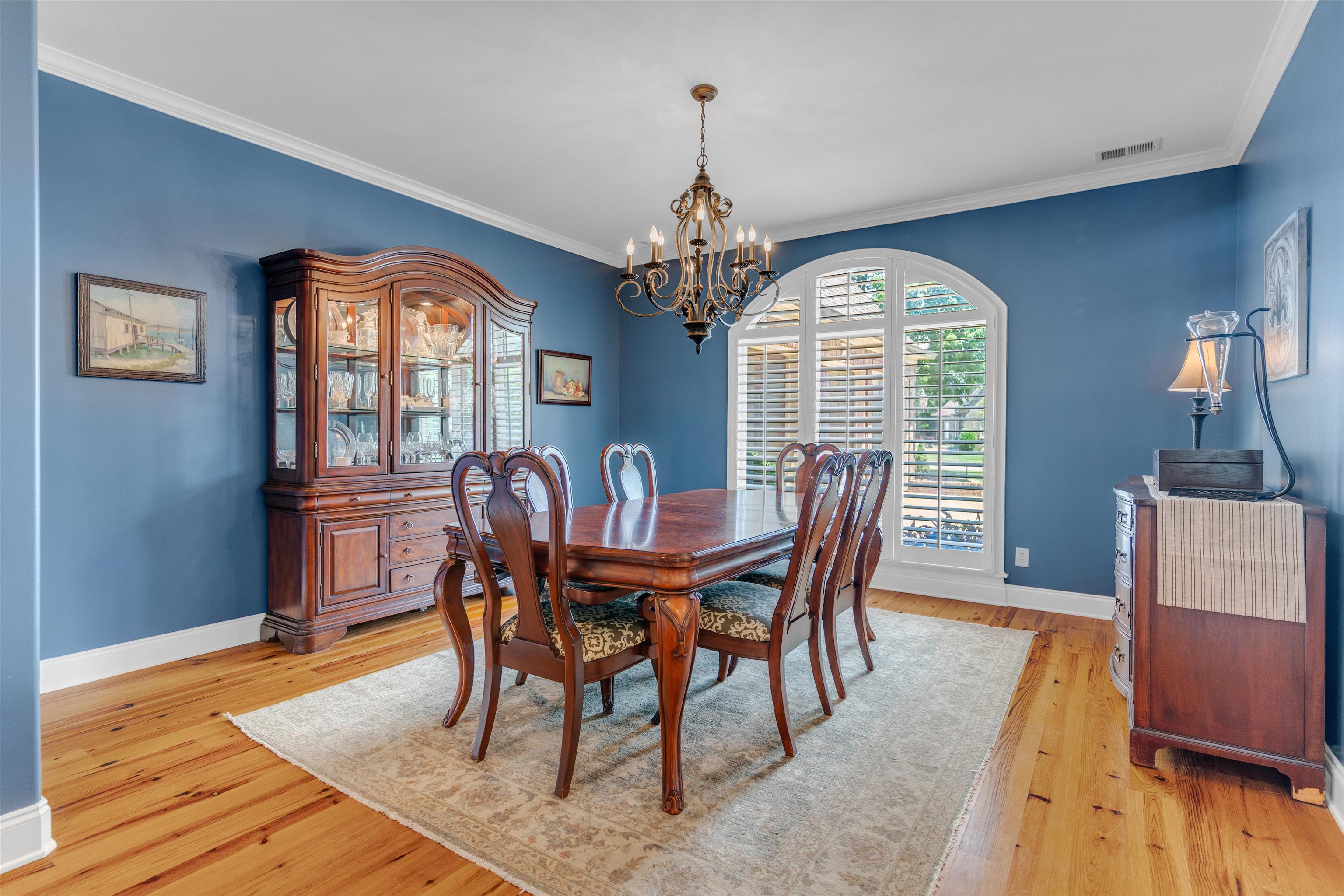 1075 Summer Spring Road Collierville, TN 38017 - Photo 6 of 40 a view of a dining room with furniture window and wooden floor