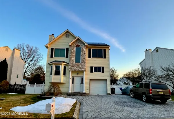 a car parked in front of a house