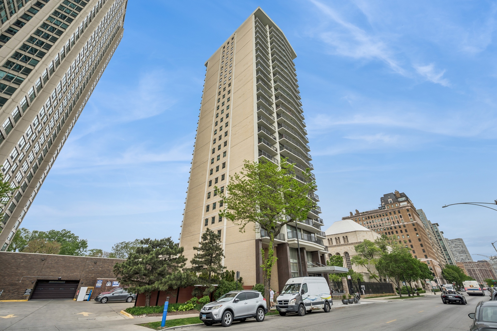 3470 North Lake Shore Drive, Unit 9BC Chicago, IL 60657 - Photo 1 of 21 a view of a buildings and car parked on the roadside