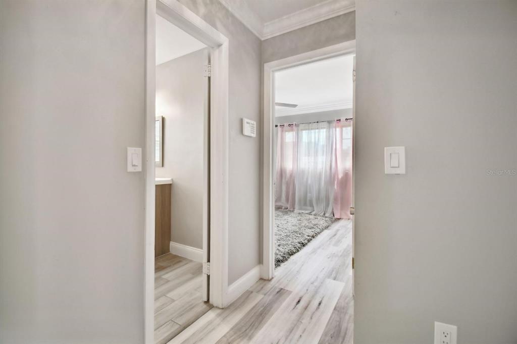 6745 Ralston Beach Circle Tampa, FL 33614 - Photo 27 of 39 a view of a bathroom from a hallway