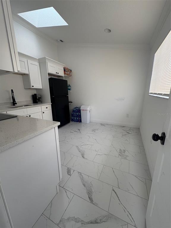 6745 Ralston Beach Circle Tampa, FL 33614 - Photo 31 of 39 a view of storage and utility room with washer and dryer