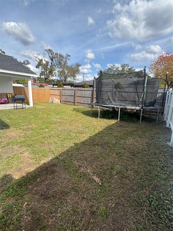 6745 Ralston Beach Circle Tampa, FL 33614 - Photo 36 of 39 a view of a garden