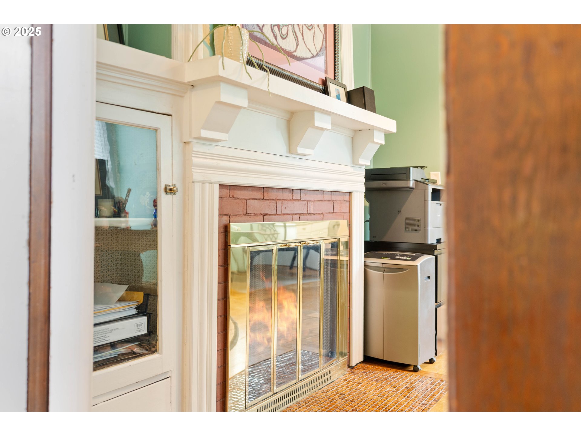 3906 South Kelly Avenue Portland, OR 97239 - Photo 15 of 42 a view of a bedroom with wooden floor and windows