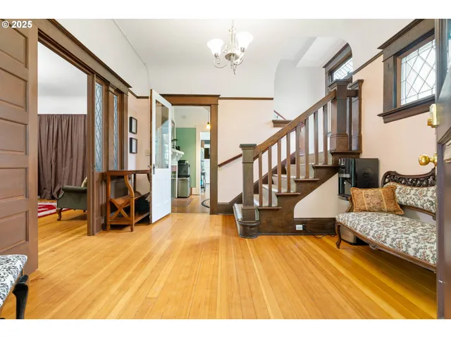 a view of living room with furniture and floor to ceiling window