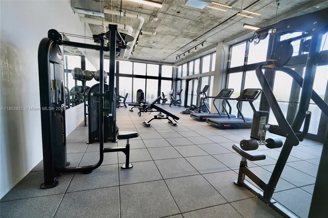 a view of swimming pool with seating area