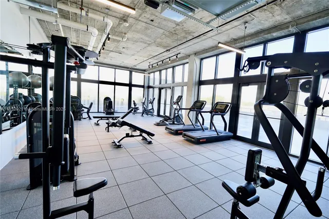 a view of a room with gym equipment
