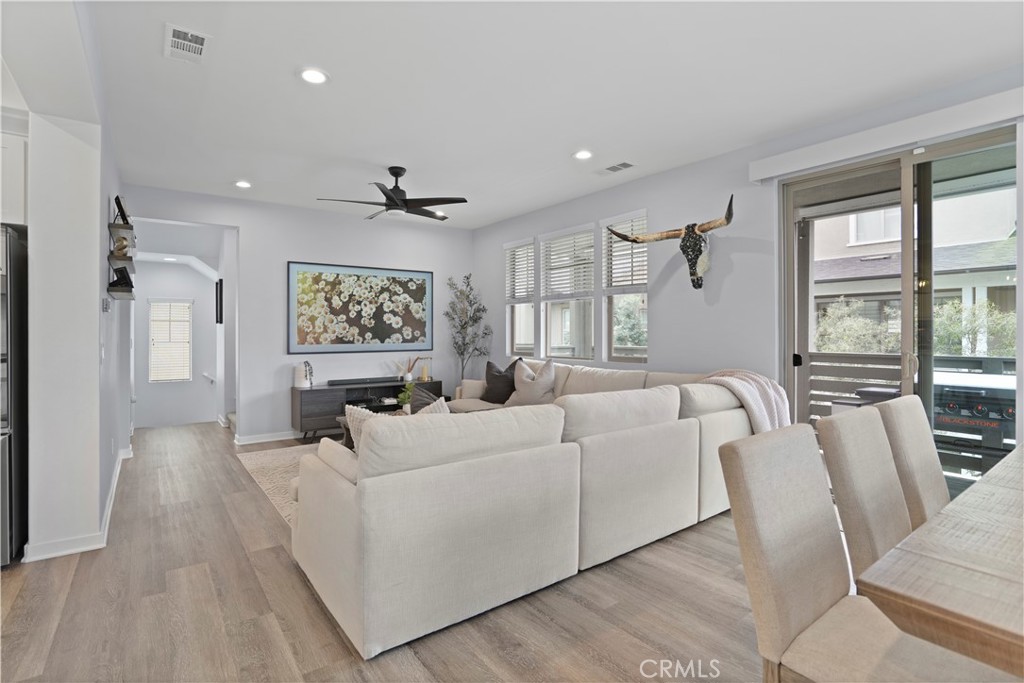 58 Vasto Street Rancho Mission Viejo, CA 92694 - Photo 15 of 66 a living room with furniture and a large window