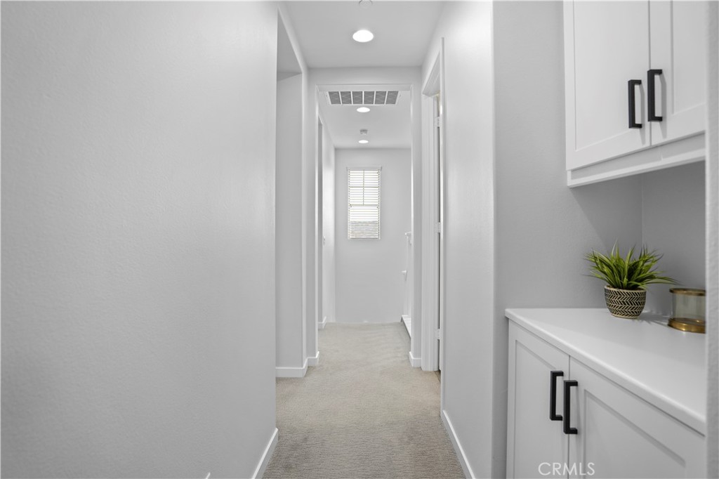 58 Vasto Street Rancho Mission Viejo, CA 92694 - Photo 26 of 66 a bathroom with a potted plant on the wall and a shower