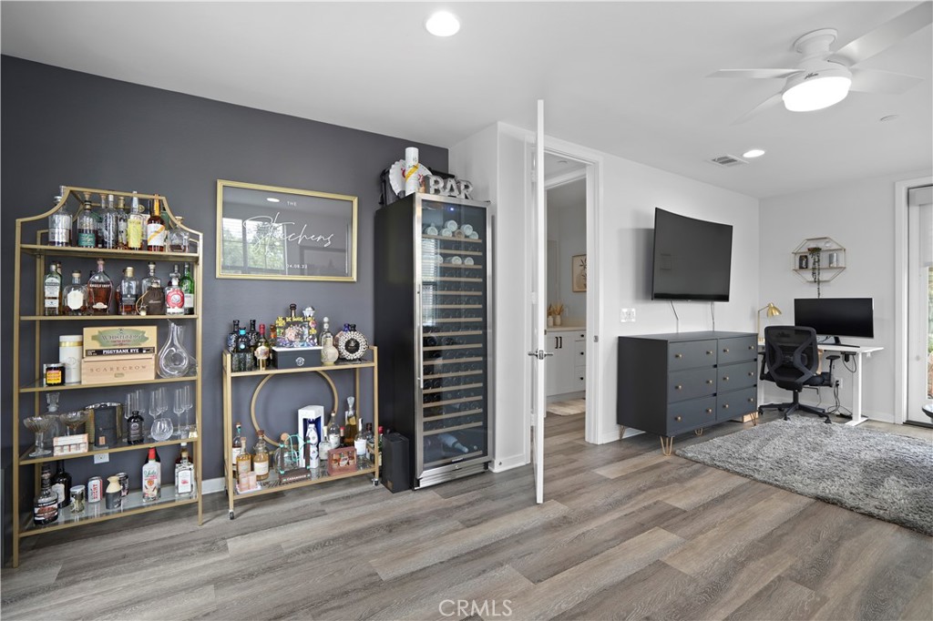 58 Vasto Street Rancho Mission Viejo, CA 92694 - Photo 4 of 66 a view of a livingroom with workspace and a window