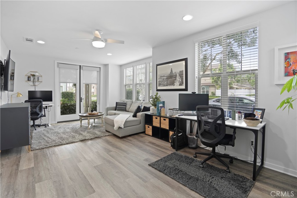 58 Vasto Street Rancho Mission Viejo, CA 92694 - Photo 5 of 66 a living room with furniture a rug a lamp and a large window