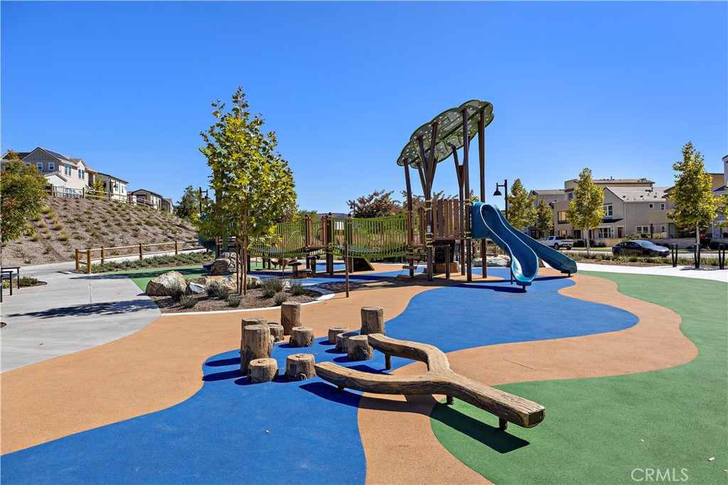 58 Vasto Street Rancho Mission Viejo, CA 92694 - Photo 65 of 66 a view of a swimming pool with a patio