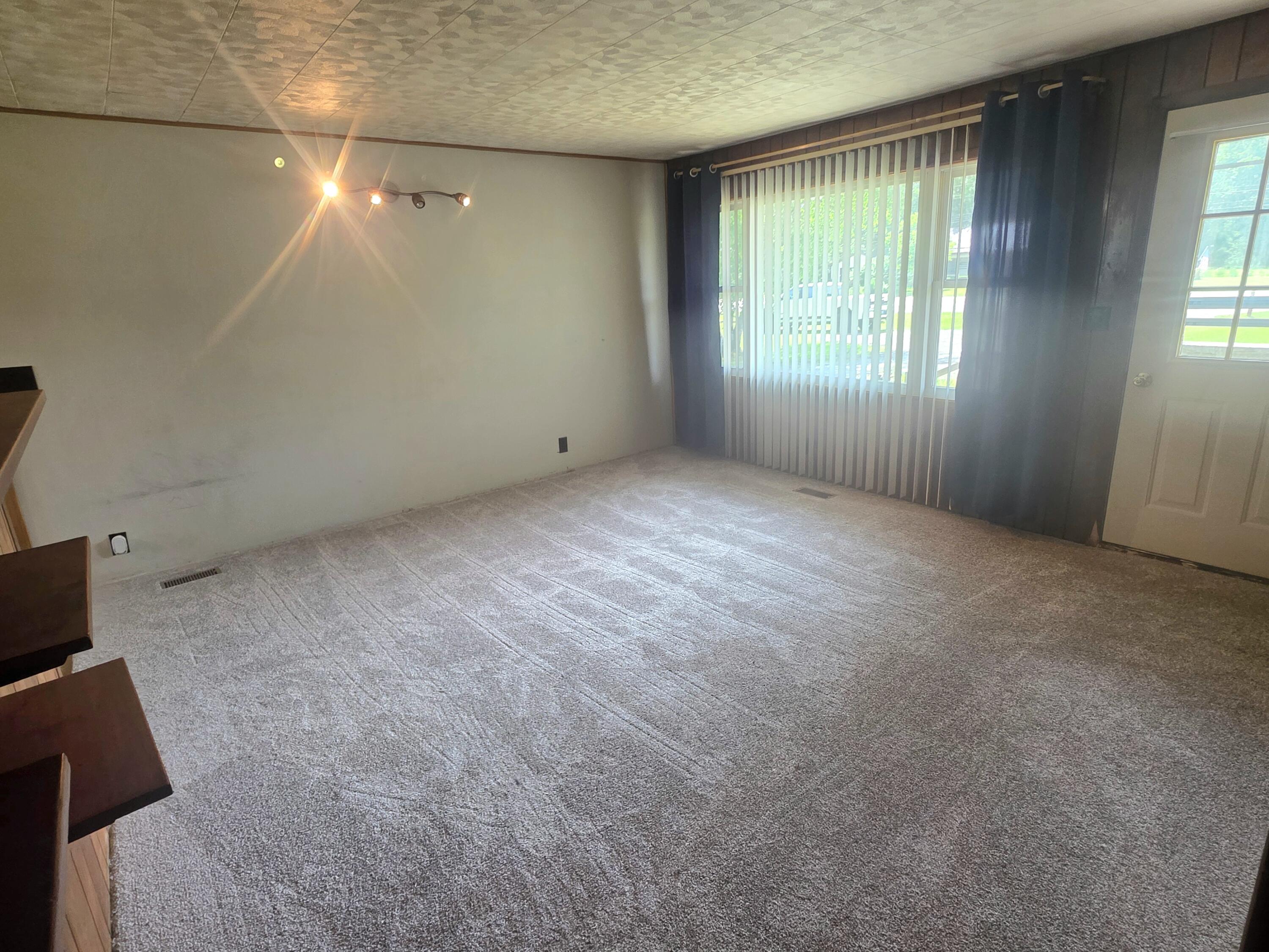 2755 South Sheridan Road Stanton, MI 48888 - Photo 9 of 18 Living Room