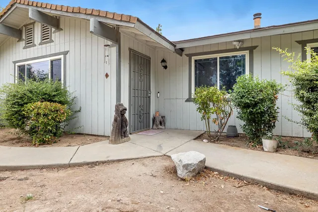 a view of a entryway door front of house