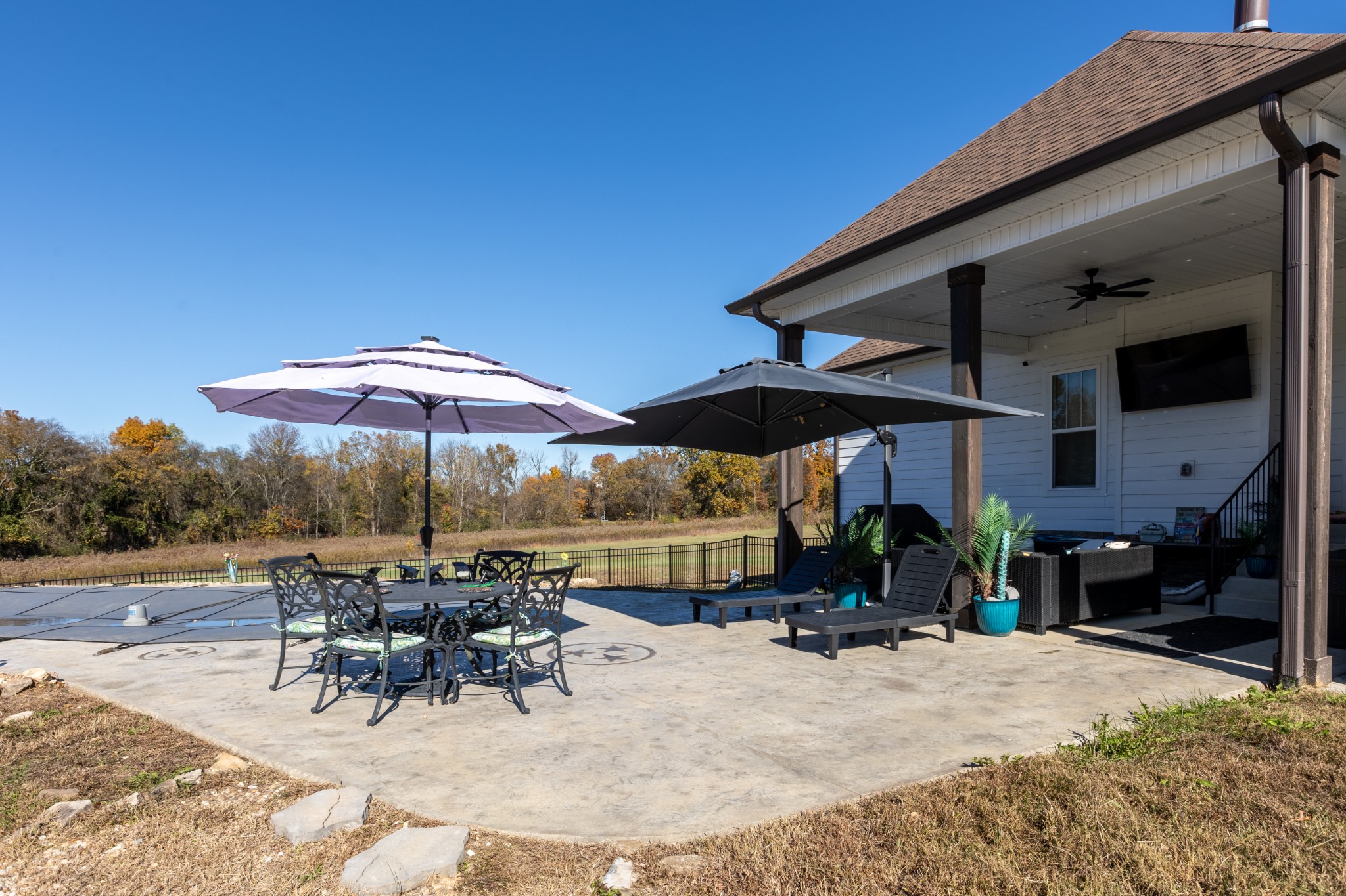 3378 New Hall Road Greenbrier, TN 37073 - Photo 15 of 67 an outdoor space with furniture and umbrella