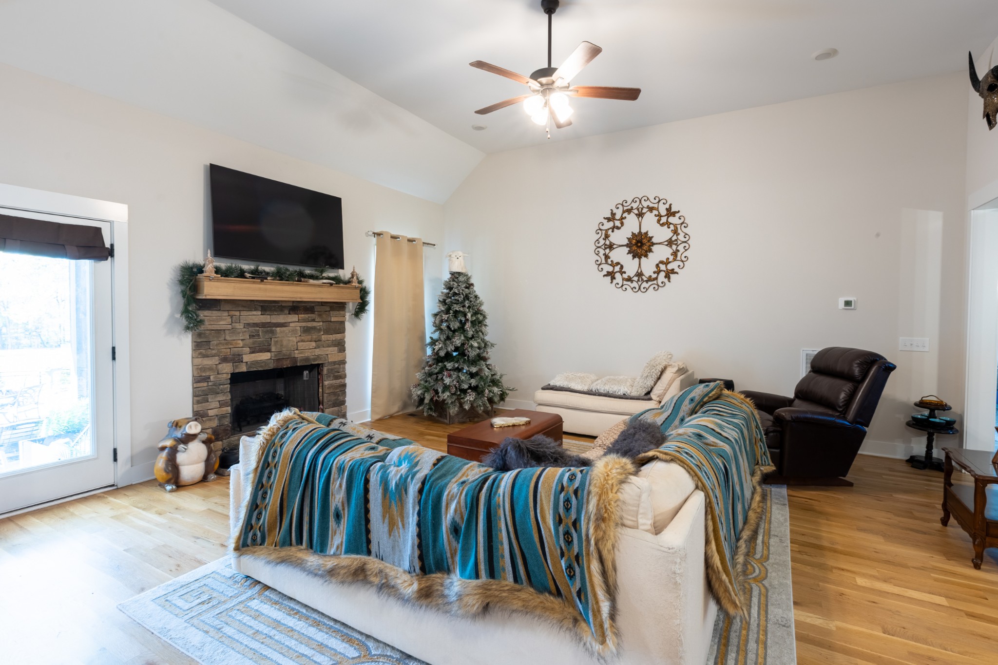 3378 New Hall Road Greenbrier, TN 37073 - Photo 24 of 67 a bedroom with a bed and flat screen tv