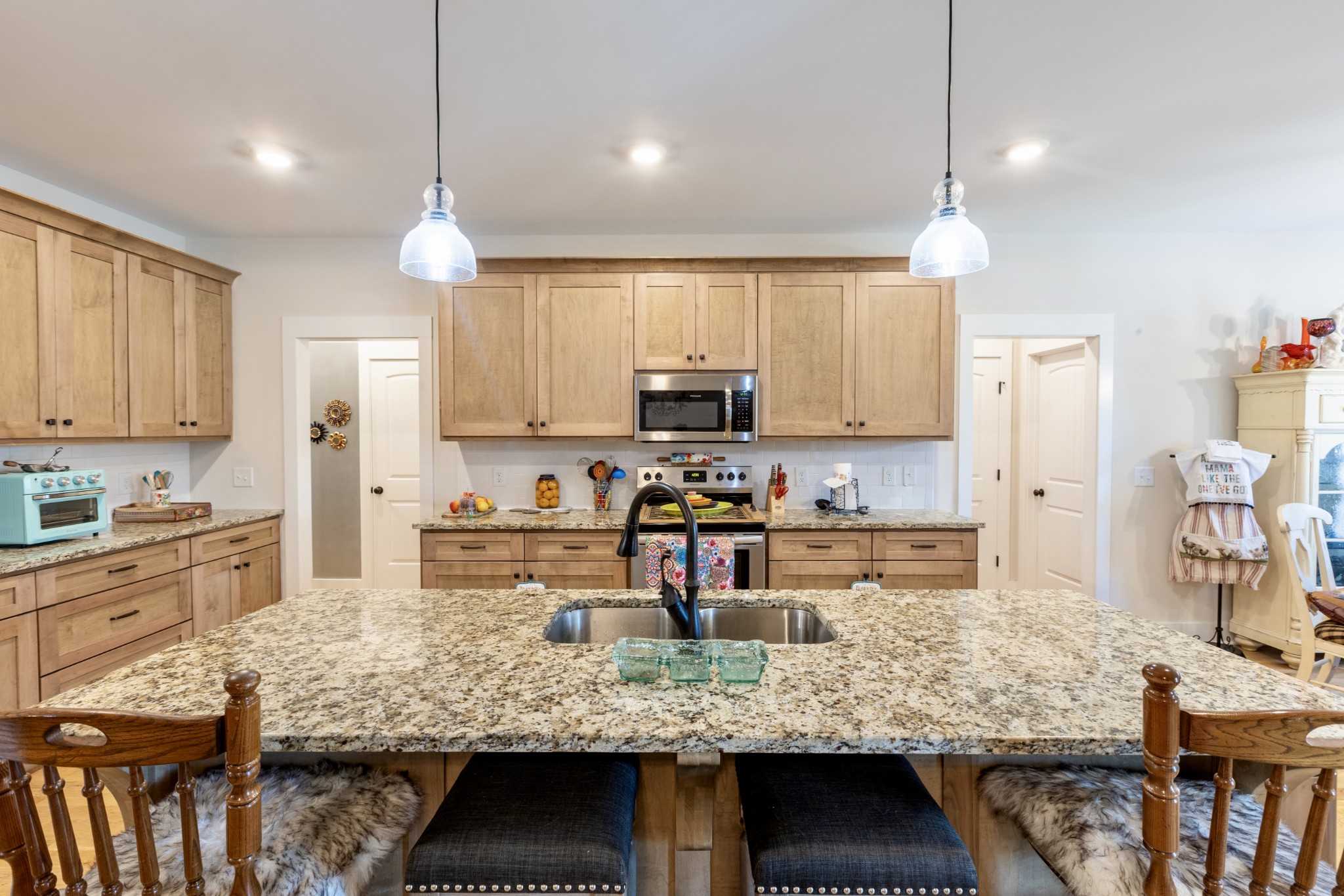 3378 New Hall Road Greenbrier, TN 37073 - Photo 27 of 67 a kitchen with stainless steel appliances granite countertop a stove a sink and a refrigerator