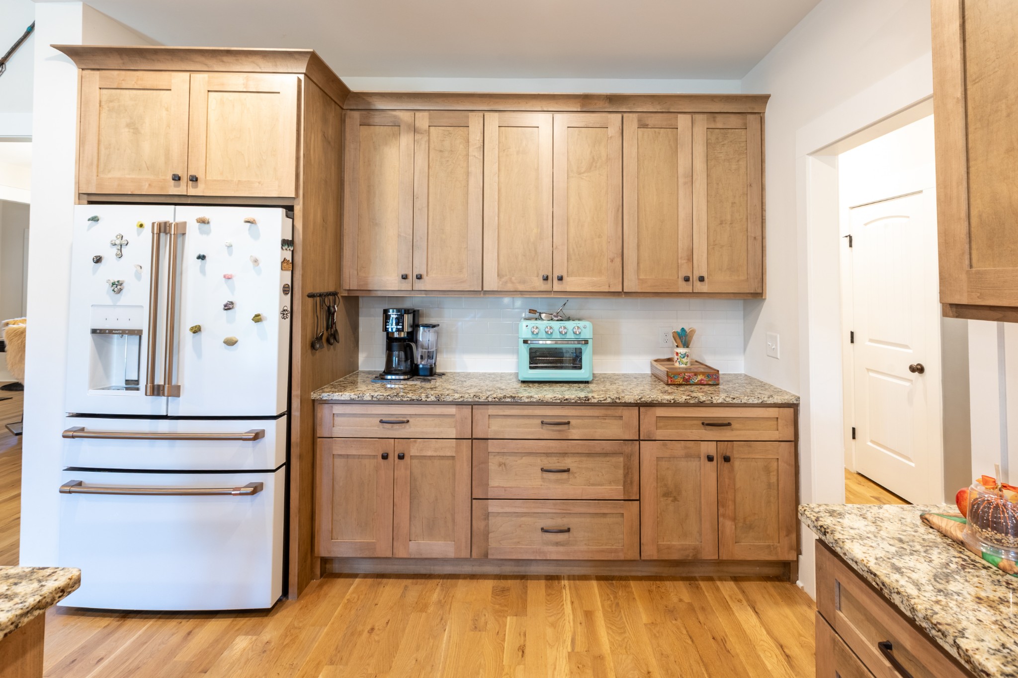 3378 New Hall Road Greenbrier, TN 37073 - Photo 28 of 67 a kitchen with stainless steel appliances granite countertop a stove a sink and a refrigerator