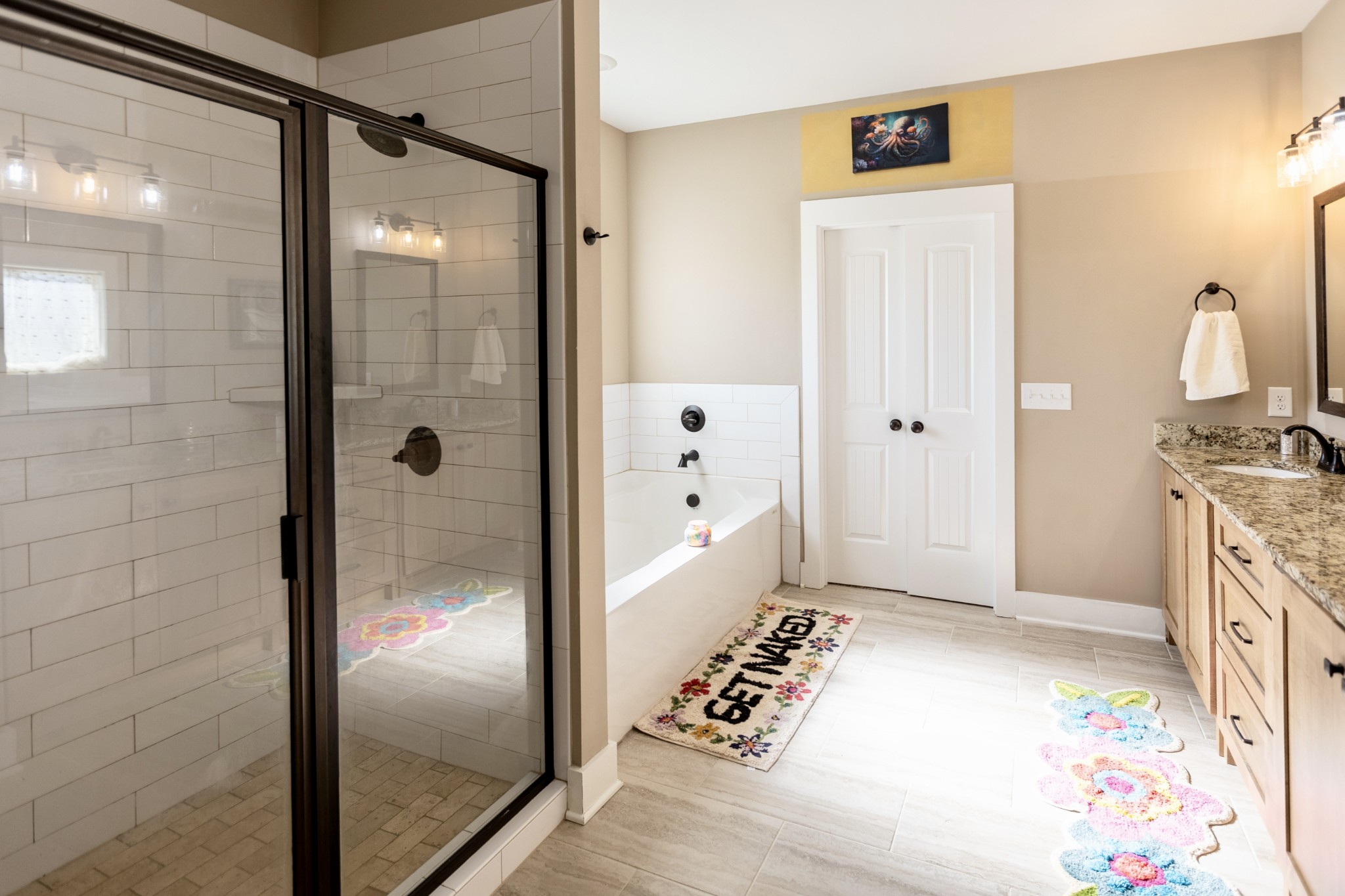 3378 New Hall Road Greenbrier, TN 37073 - Photo 37 of 67 a bathroom with a tub shower and sink