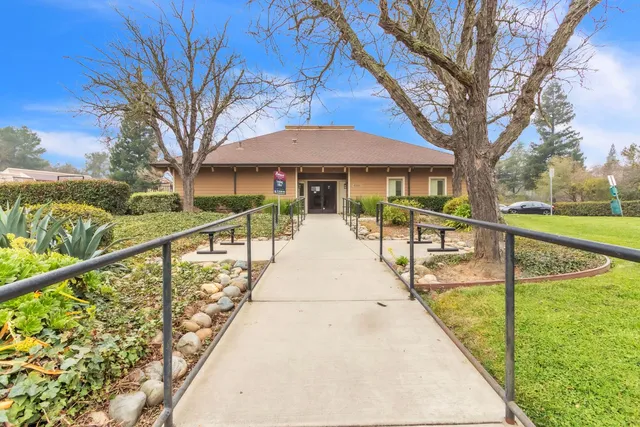 a view of swimming pool with a patio