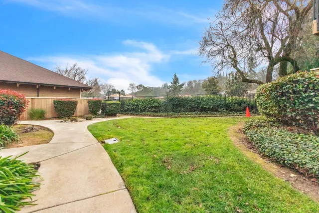 a view of a house with garden